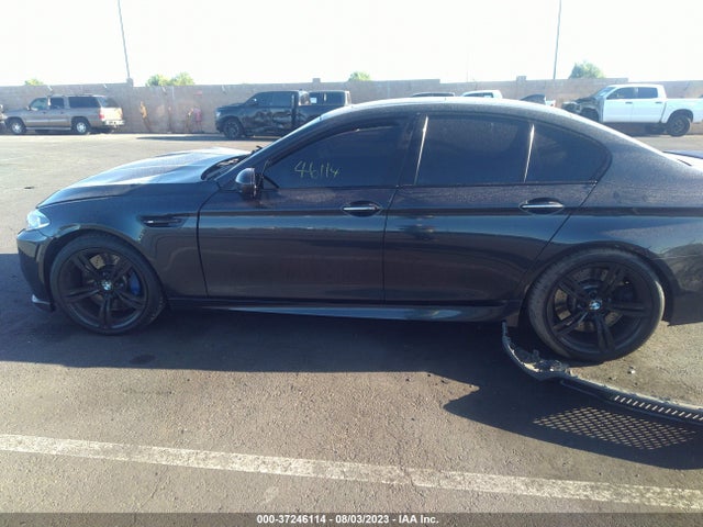 2015 BMW M5, VIN: WBSFV9C54FD595324