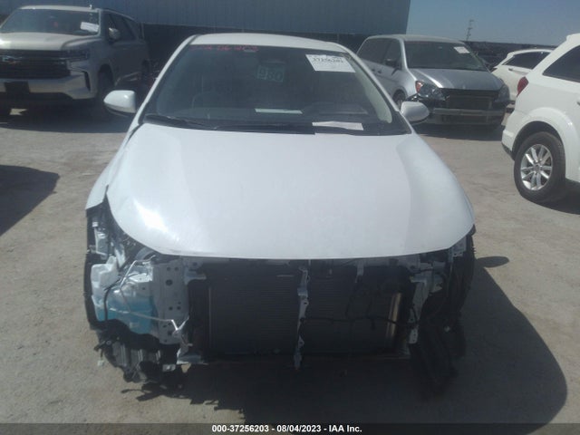 Toyota Corolla Hybrid 2023 JTDBCMFE3P3014672 Image 4