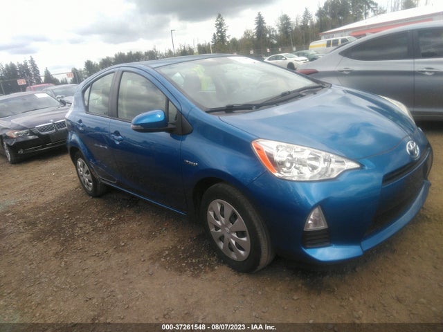 Toyota Prius C One/three/two/four 2014 JTDKDTB37E1572156 Image 1