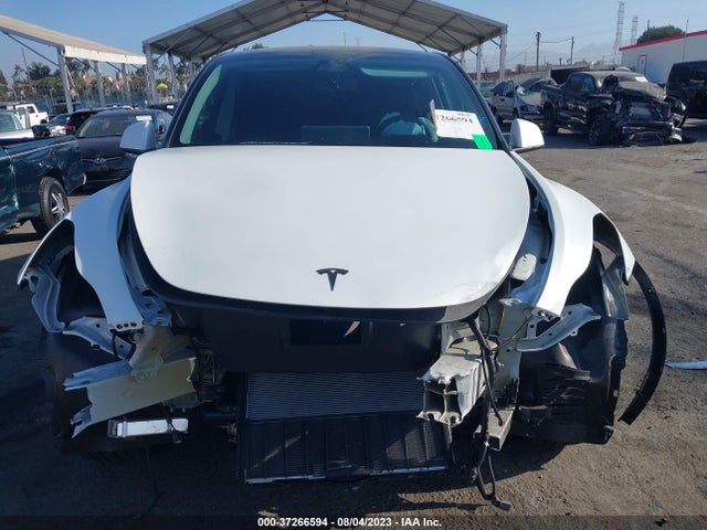 Tesla Model Y Long Range 2023 7SAYGDEE5PA126313 Image 4