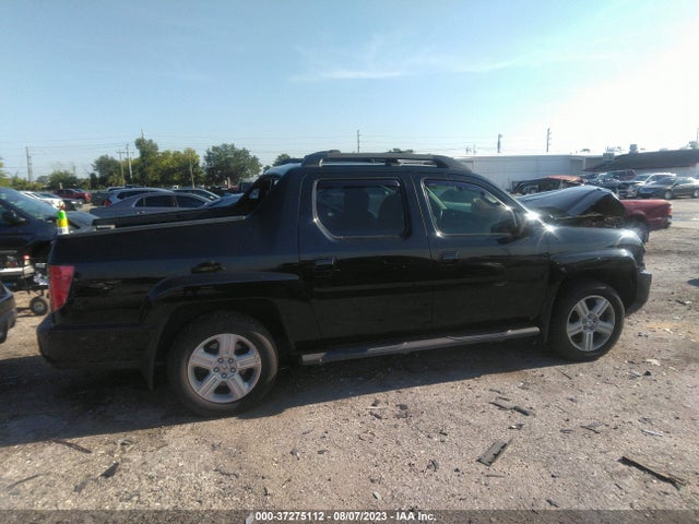 2011 HONDA RIDGELINE RTL VIN: 5FPYK1F56BB007102