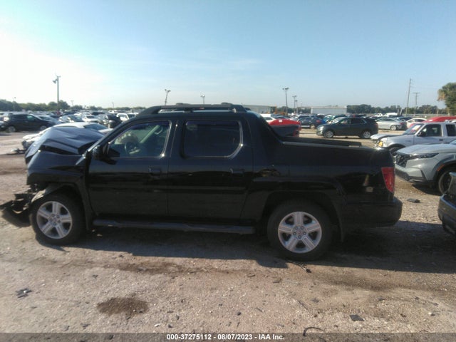 2011 HONDA RIDGELINE RTL VIN: 5FPYK1F56BB007102