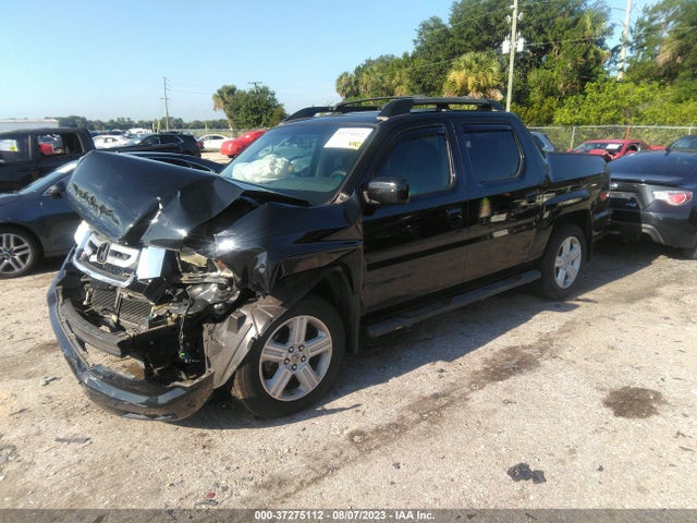 2011 HONDA RIDGELINE RTL VIN: 5FPYK1F56BB007102