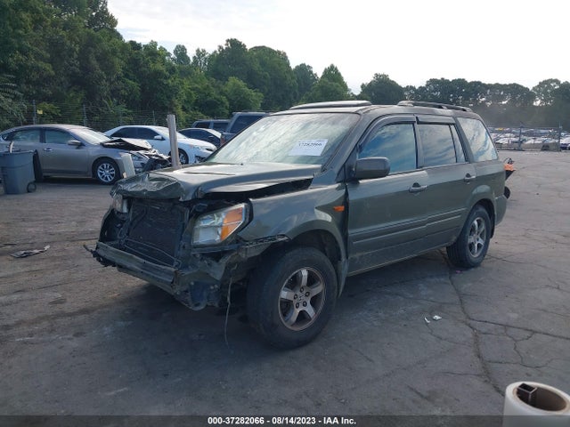 2007 HONDA PILOT EX-L VIN: 5FNYF28557B030281