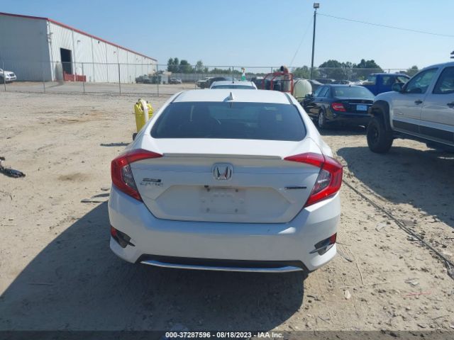 JHMFC1F95KX004387 Honda Civic Sedan Touring