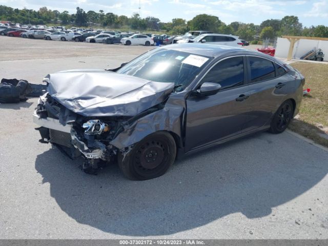 19XFC2F6XKE004527 Honda Civic Sedan Lx