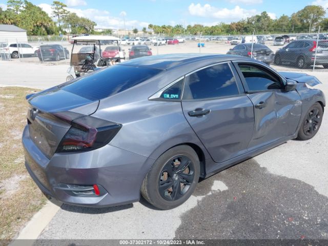 19XFC2F6XKE004527 Honda Civic Sedan Lx