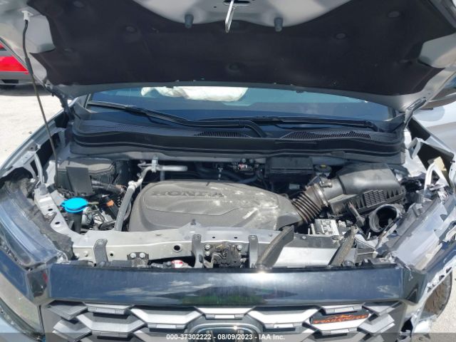 5FNYF8H68PB009291 Honda Passport Trailsport