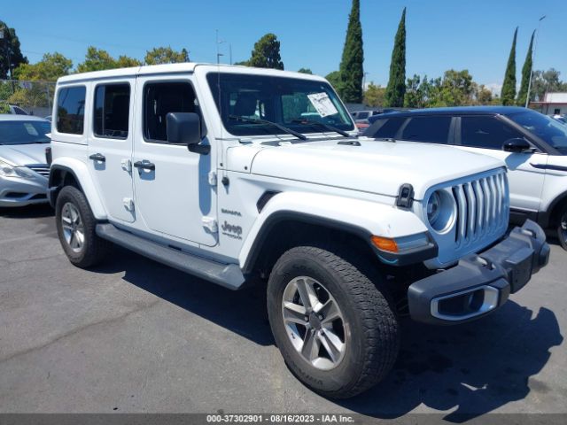 1C4HJXEN8MW697059, 2021 Jeep Wrangler Unlimited Sahara on IAAI