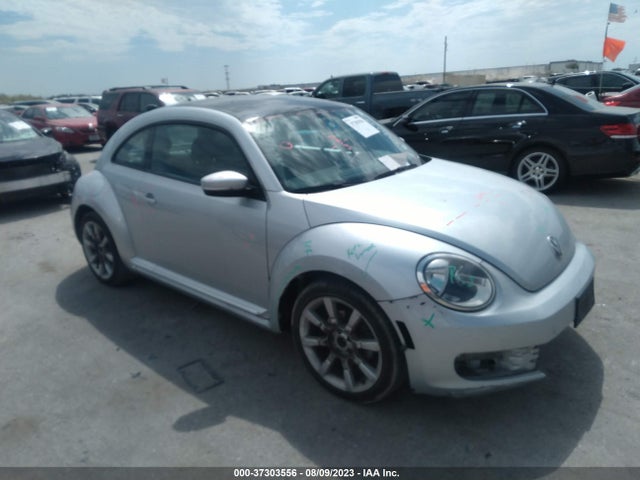 2013 VOLKSWAGEN BEETLE COUPE 2.5L W/SUN/SOUND/NAV VIN: 3VWJP7AT4DM630363