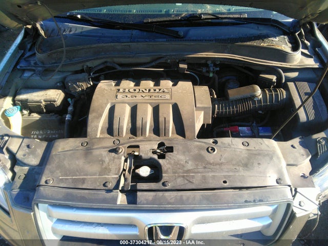 2007 HONDA PILOT EX-L VIN: 5FNYF18577B033015