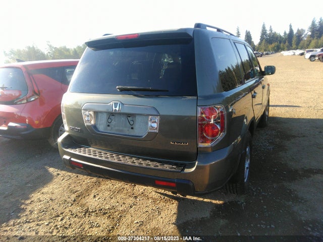 2007 HONDA PILOT EX-L VIN: 5FNYF18577B033015