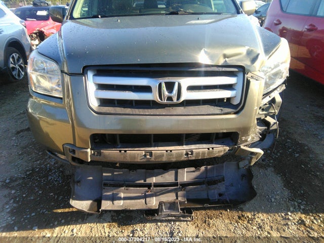 2007 HONDA PILOT EX-L VIN: 5FNYF18577B033015