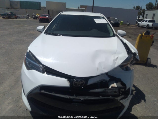 2018 TOYOTA COROLLA LE VIN: 2T1BURHE8JC026130