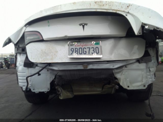 5YJ3E1EAXMF057433 Tesla Model 3 Standard Range Plus