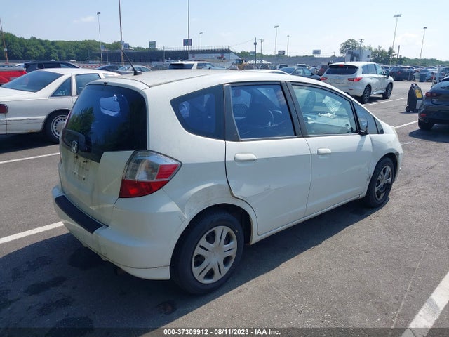 2011 HONDA FIT VIN: JHMGE8H30BS004200