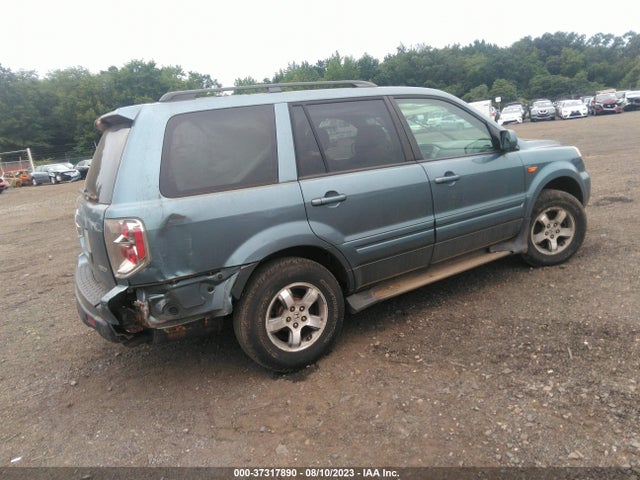 2007 HONDA PILOT EX-L VIN: 2HKYF18587H513467