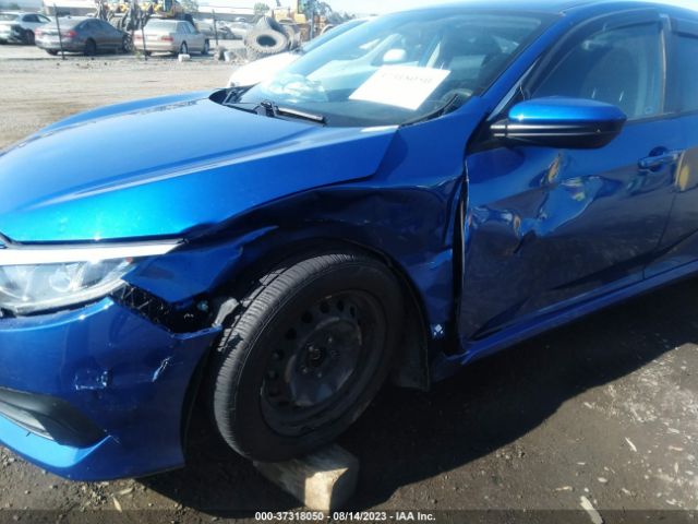 19XFC2F57JE204304 Honda Civic Sedan Lx