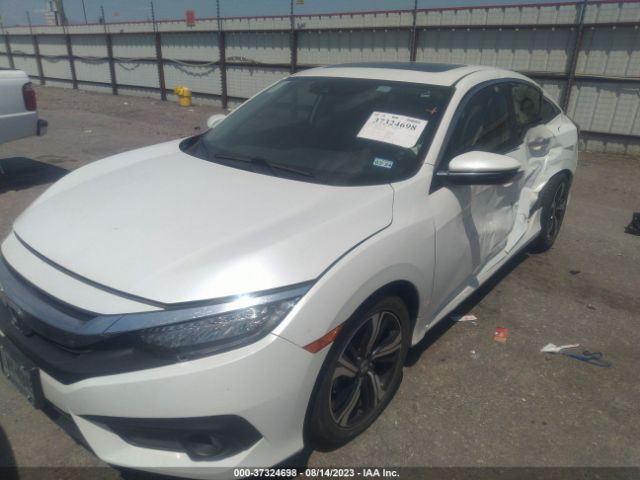 JHMFC1F93JX027973 Honda Civic Sedan Touring