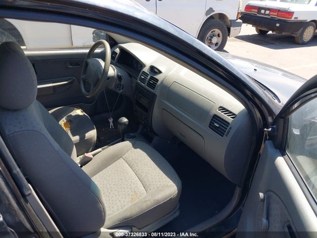 2003 KIA RIO VIN: KNADC125X36231056