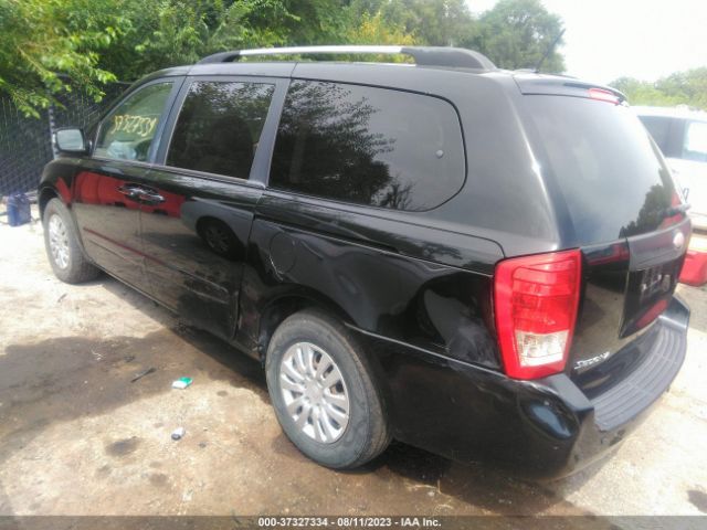 KNDMG4C71E6537879 KIA SEDONA LX