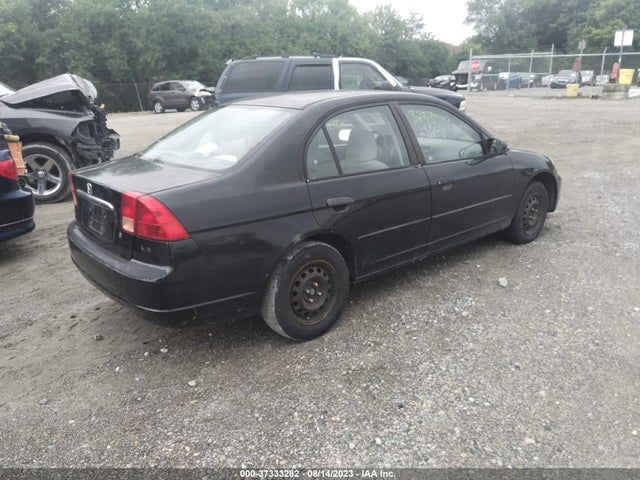 2001 HONDA CIVIC LX VIN: 1HGES15581L064394
