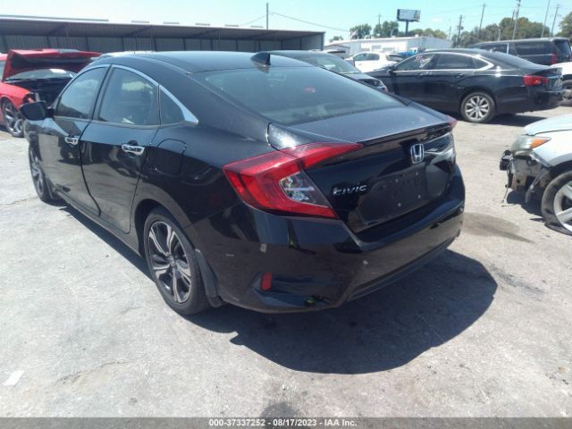 JHMFC1F97JX005894 Honda Civic Sedan Touring