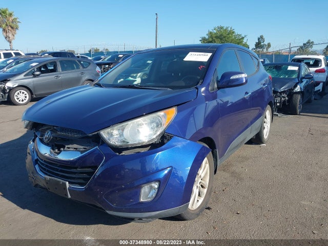 2012 HYUNDAI TUCSON LIMITED VIN: KM8JUCACXCU477403