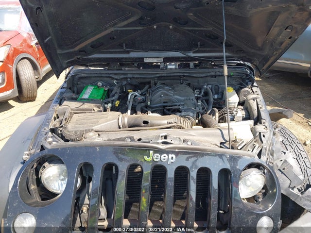 1C4HJWDG0EL130103 Jeep Wrangler Unlimited Sport