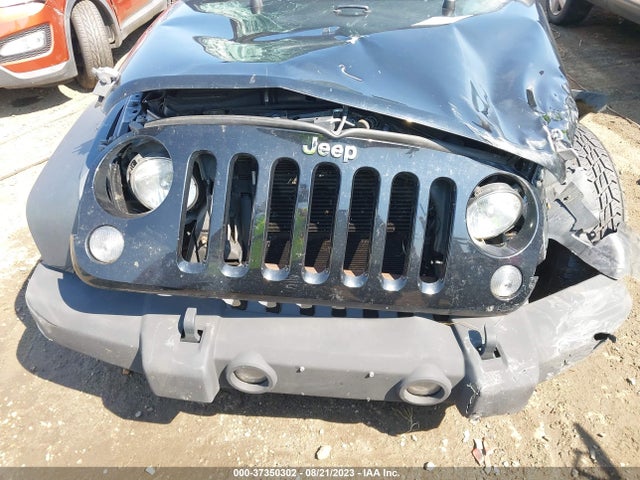 1C4HJWDG0EL130103 Jeep Wrangler Unlimited Sport