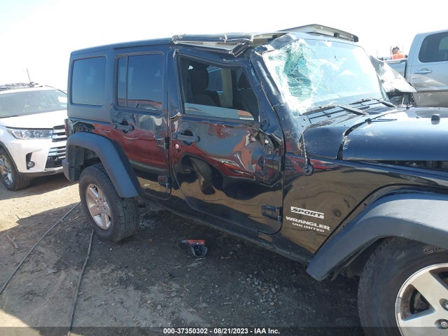 1C4HJWDG0EL130103 Jeep Wrangler Unlimited Sport