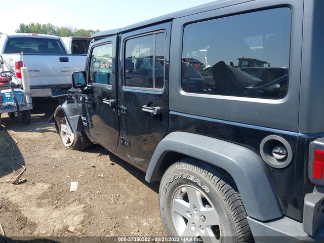 1C4HJWDG0EL130103 Jeep Wrangler Unlimited Sport