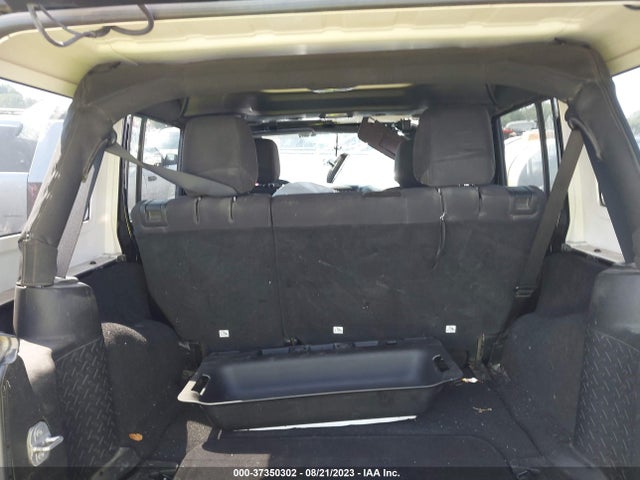 1C4HJWDG0EL130103 Jeep Wrangler Unlimited Sport