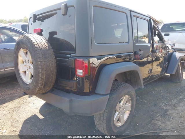 1C4HJWDG0EL130103 Jeep Wrangler Unlimited Sport
