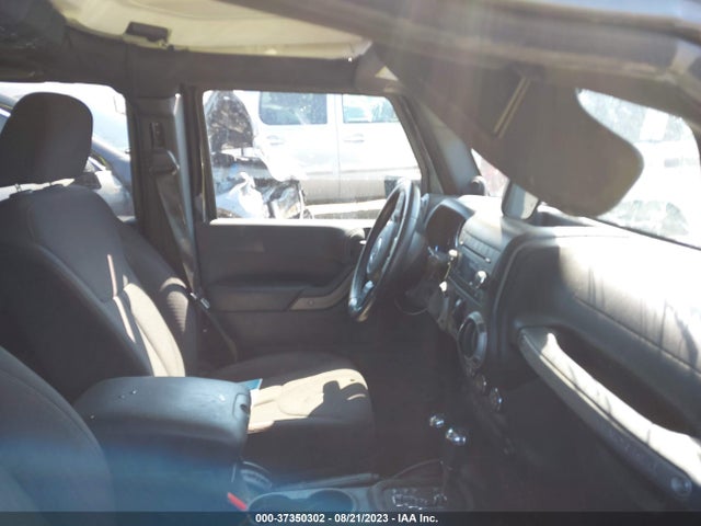 1C4HJWDG0EL130103 Jeep Wrangler Unlimited Sport