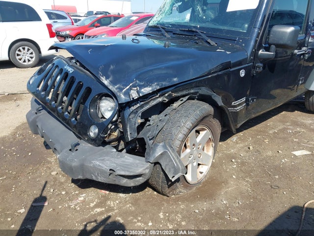 1C4HJWDG0EL130103 Jeep Wrangler Unlimited Sport