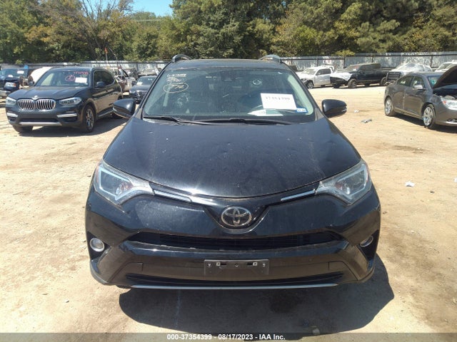 2018 TOYOTA RAV4 XLE VIN: 2T3WFREV0JW459821