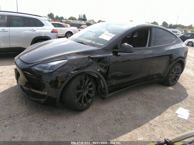 Tesla Model Y Long Range 2023 7SAYGDEE0PF707396 Image 2