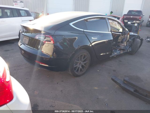 5YJ3E1EA3KF325090 Tesla Model 3 Range