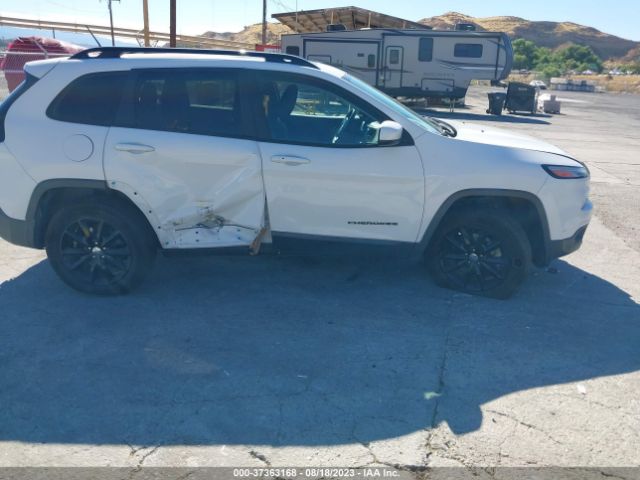 1C4PJMCS7EW296221 Jeep Cherokee Altitude