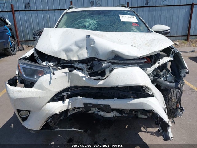 2016 TOYOTA RAV4 HYBRID XLE VIN: JTMRJREV1GD036893