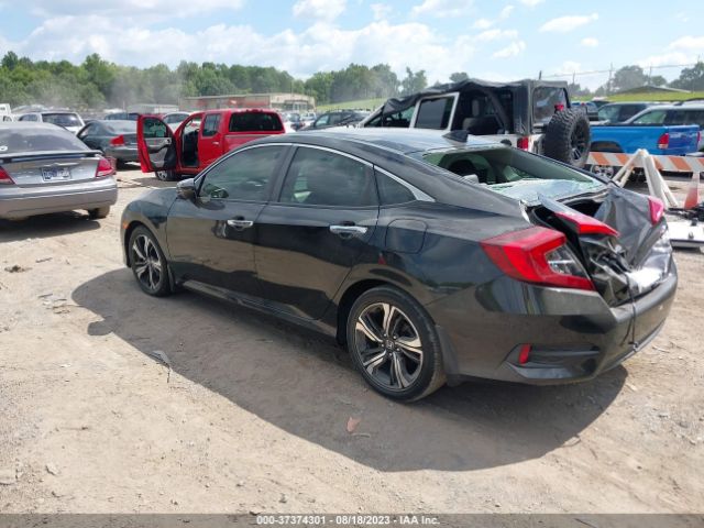 JHMFC1F9XJX019756 Honda Civic Sedan Touring