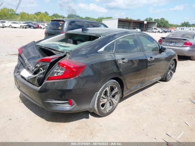 JHMFC1F9XJX019756 Honda Civic Sedan Touring
