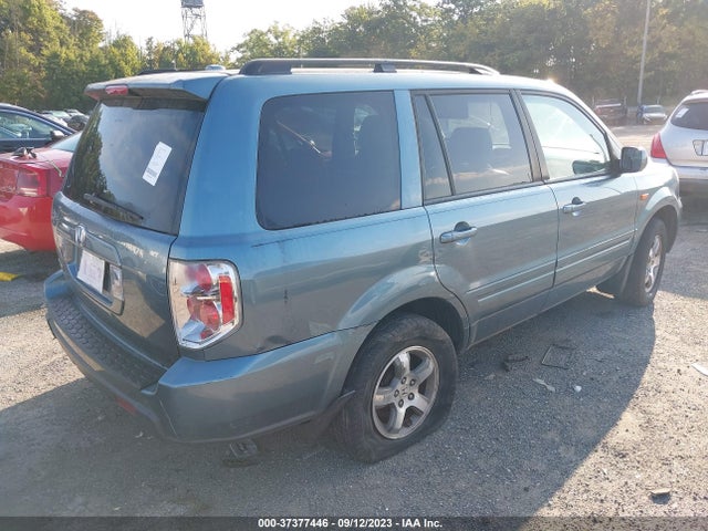 2007 HONDA PILOT EX-L VIN: 5FNYF28647B010905
