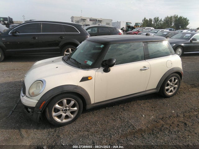 2007 MINI COOPER HARDTOP VIN: WMWMF33597TT54842