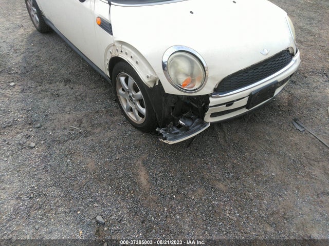 2007 MINI COOPER HARDTOP VIN: WMWMF33597TT54842
