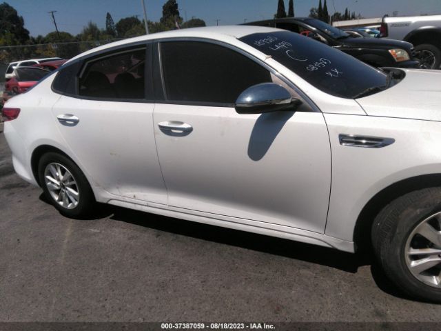 5XXGT4L34GG050038 KIA Optima Lx