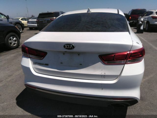 5XXGT4L34GG050038 KIA Optima Lx