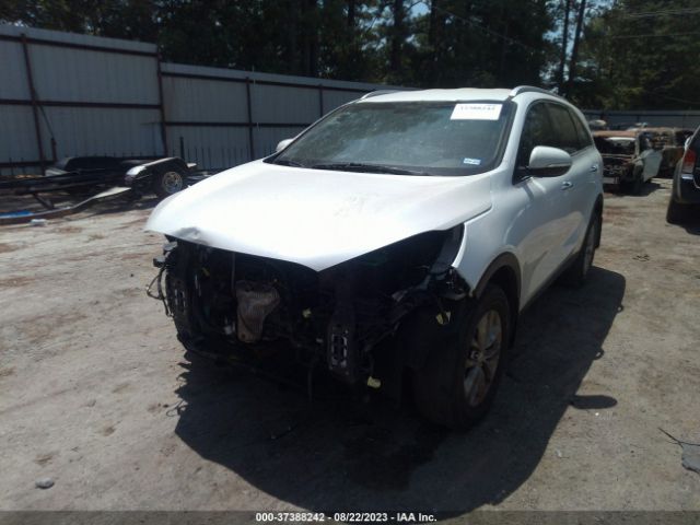 5XYPG4A59GG031022 KIA SORENTO LX