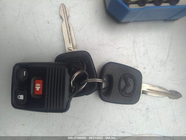 2004 MAZDA TRIBUTE LX VIN: 4F2CZ04104KM22916